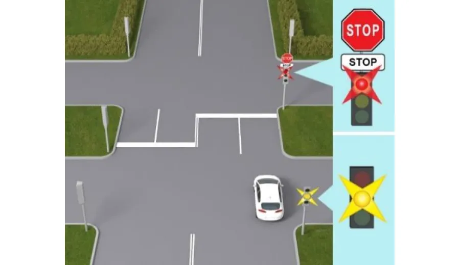 Як повинен вчинити водій білого автомобіля, що виїхав на перехрещення проїзних частин на зелений сигнал світлофора?